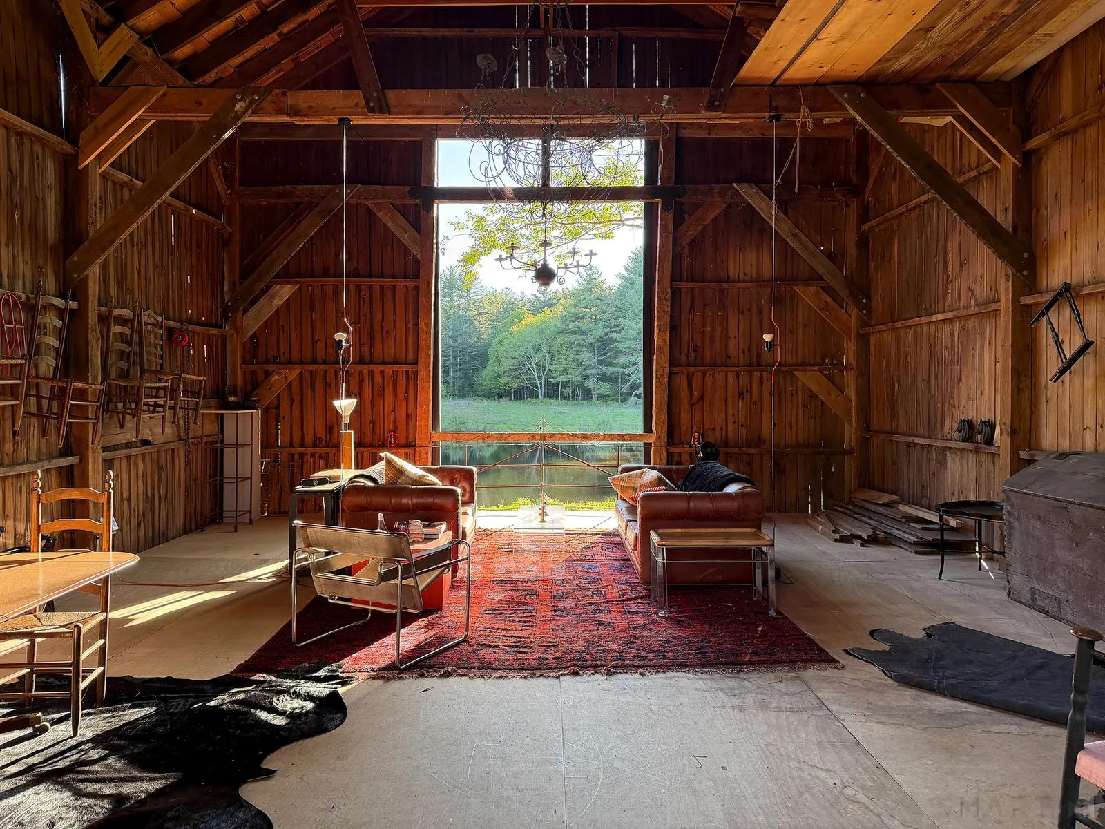 Open party barn overlooking the pond