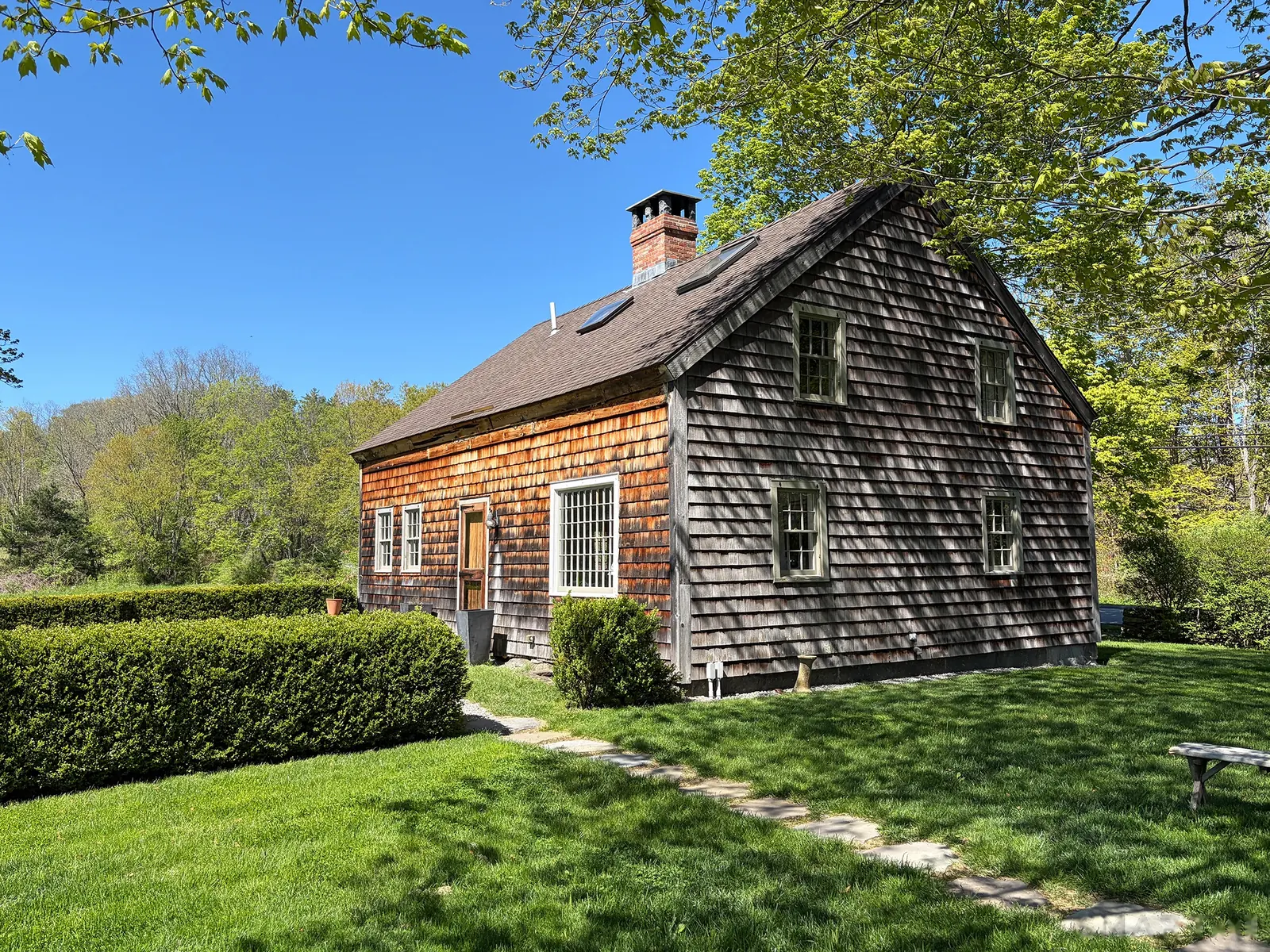 Historic shingled cottage in the garden